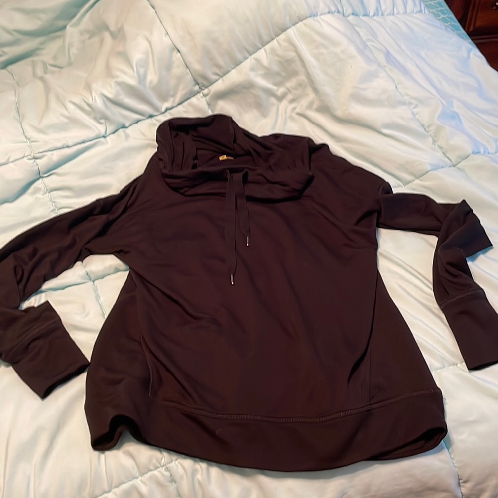 Thin hoodie with a baggy neck (makes the plain black more interesting),